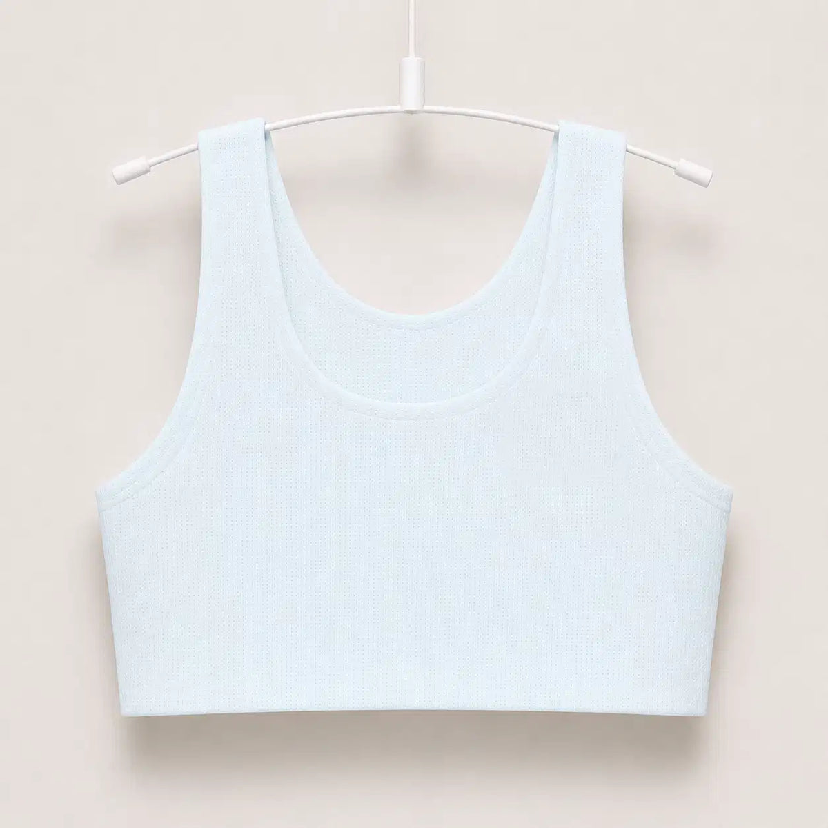 Le Premier Soutien-Gorge™